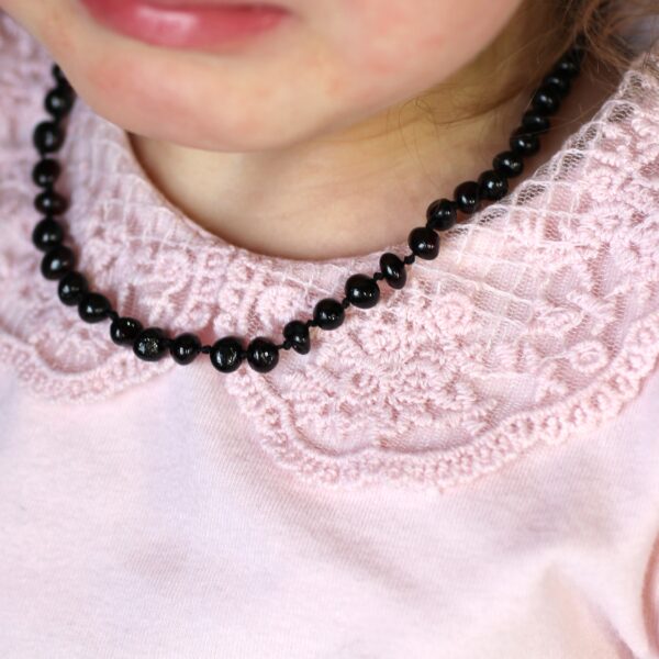 Gintariniai vaikiški karoliai