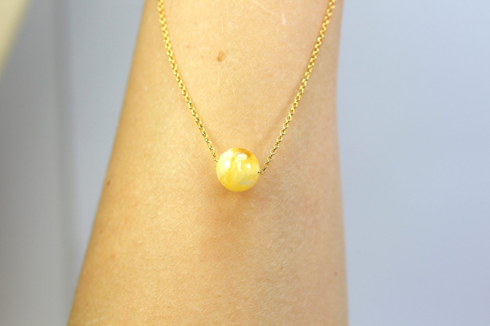 Amber pendant with gold plated 925 