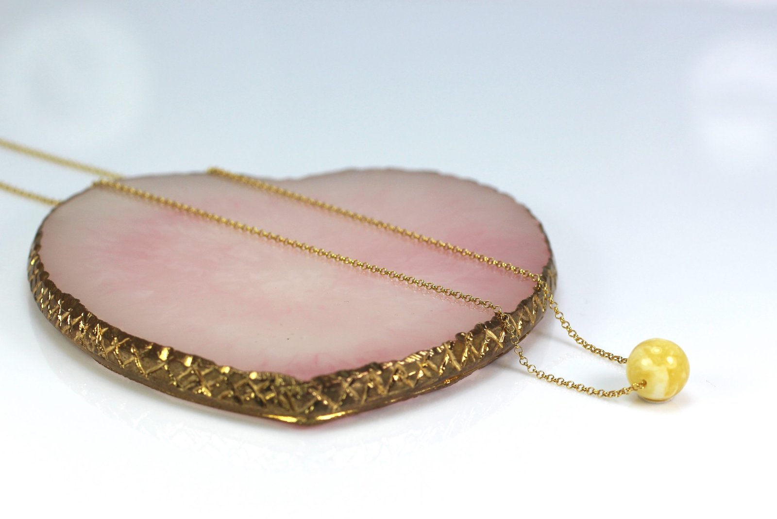 Amber pendant with gold plated 925 