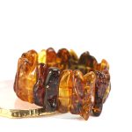 Prabangi, masyvi gintarinė apyrankė, mažai apdirbta