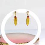 Kabantys gintariniai auskarai lašeliai