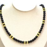 Amber fashionable necklace black color unique details