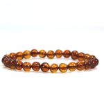 Rudos spalvos, natūralaus Baltijos gintaro apyrankė