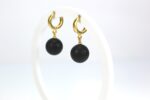 Kabantys juodo gintaro auskarai