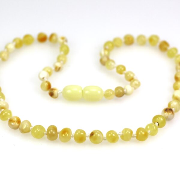 vaikiški gintaro karoliai