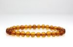 Baltic amber bracelet, brown color, rounded beads - Image 4