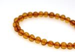 Baltic amber bracelet, brown color, rounded beads - Image 3